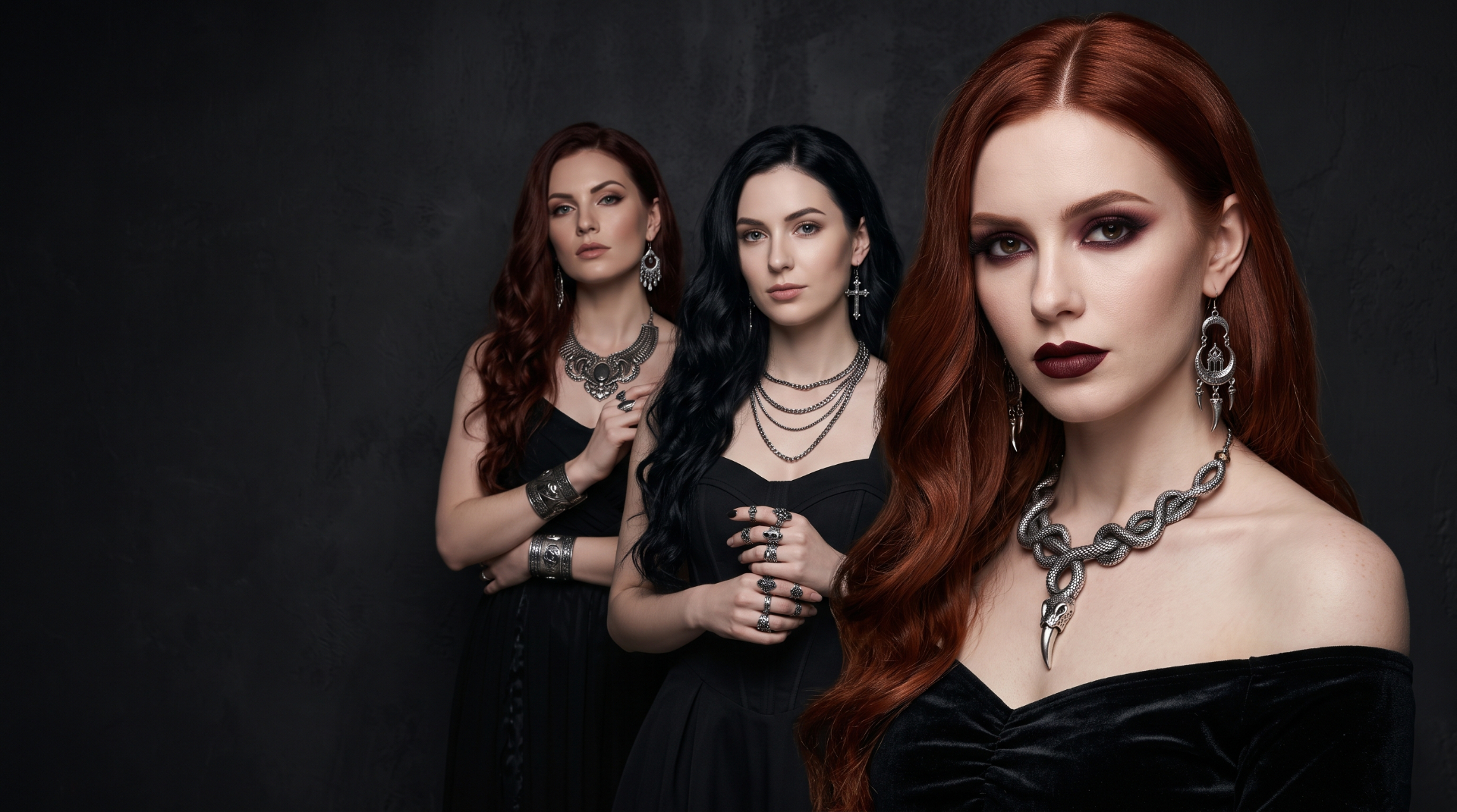 Women wearing gothic jewelry